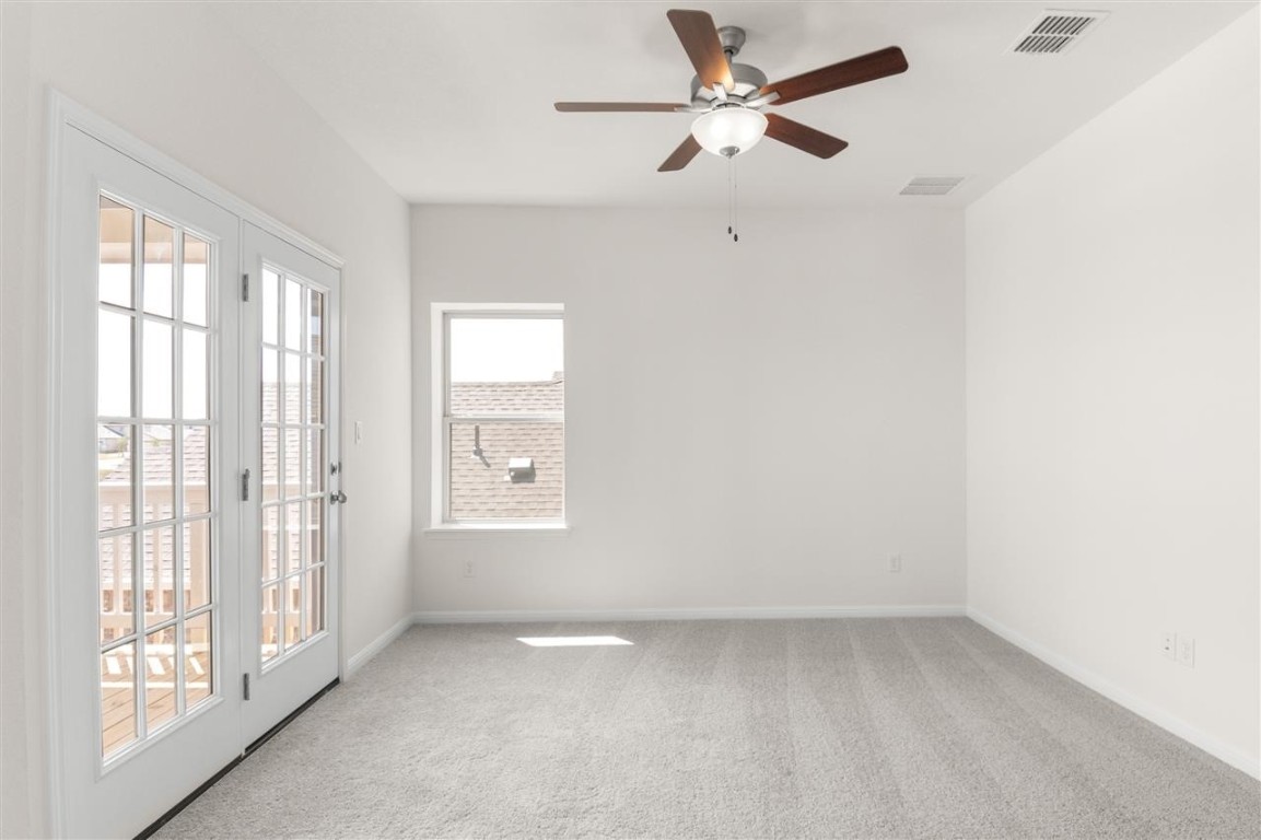 709 Paddock Lane Georgetown, TX 78626 - Photo 20 of 35 a view of an empty room with a window