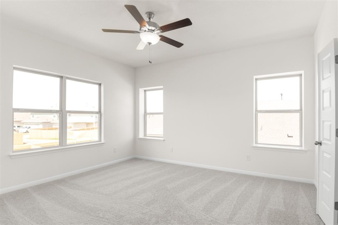 709 Paddock Lane Georgetown, TX 78626 - Photo 21 of 35 an empty room with a window