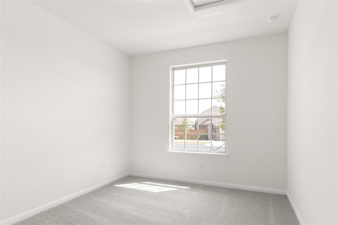 709 Paddock Lane Georgetown, TX 78626 - Photo 29 of 35 an empty room with a window