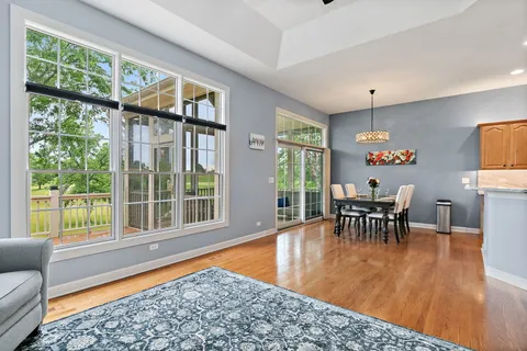 a view of a dining room with furniture window and outside view