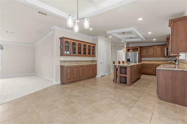 a bathroom with a granite countertop sink a toilet and a mirror