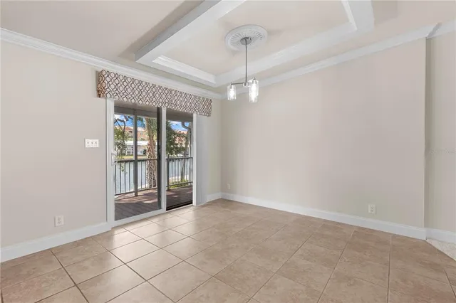a view of a balcony with floor to ceiling windows