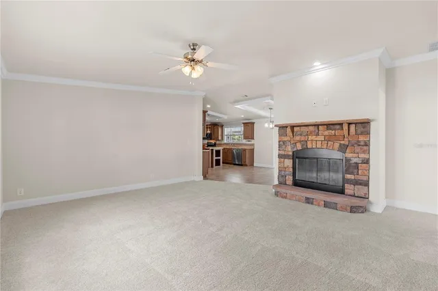 an aerial view of residential building with outdoor space and lake view