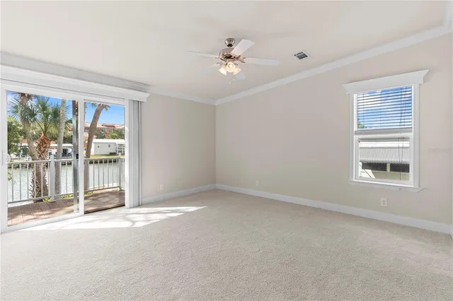 a view of an empty room with empty shelves
