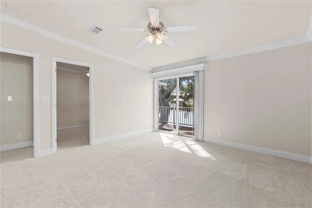 a view of a balcony with chairs