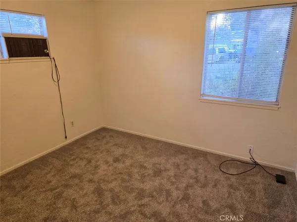 a view of a room with rack on the wall