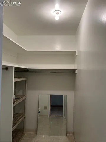 a hallway with cabinets