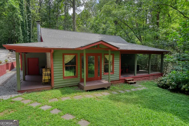 a view of a livingroom with wooden floor