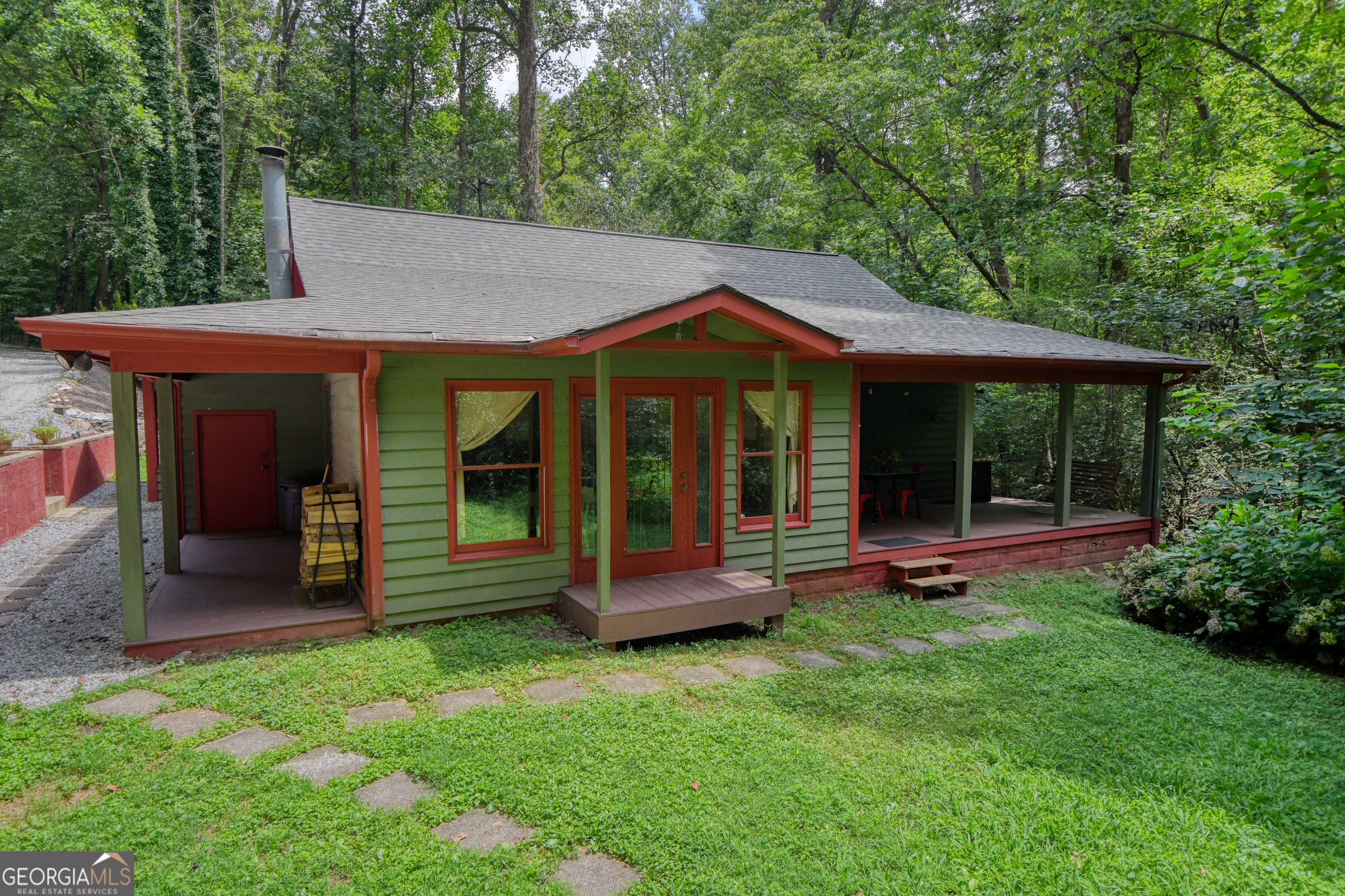 31 Creekside Lane Clayton, GA 30525 - Photo 30 of 65 a front view of a house with garden