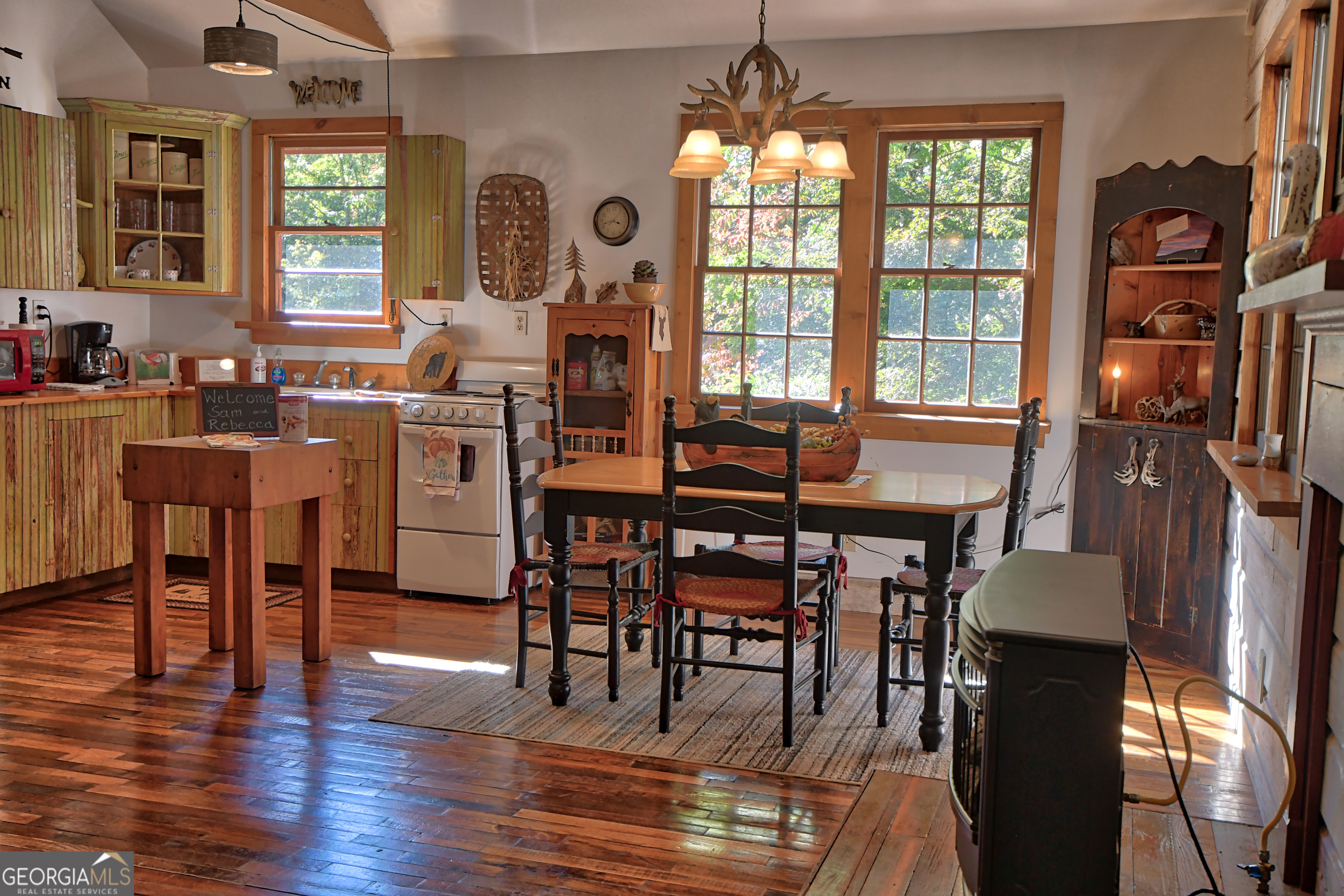 31 Creekside Lane Clayton, GA 30525 - Photo 37 of 65 a view of a a dining room with furniture window and wooden floor