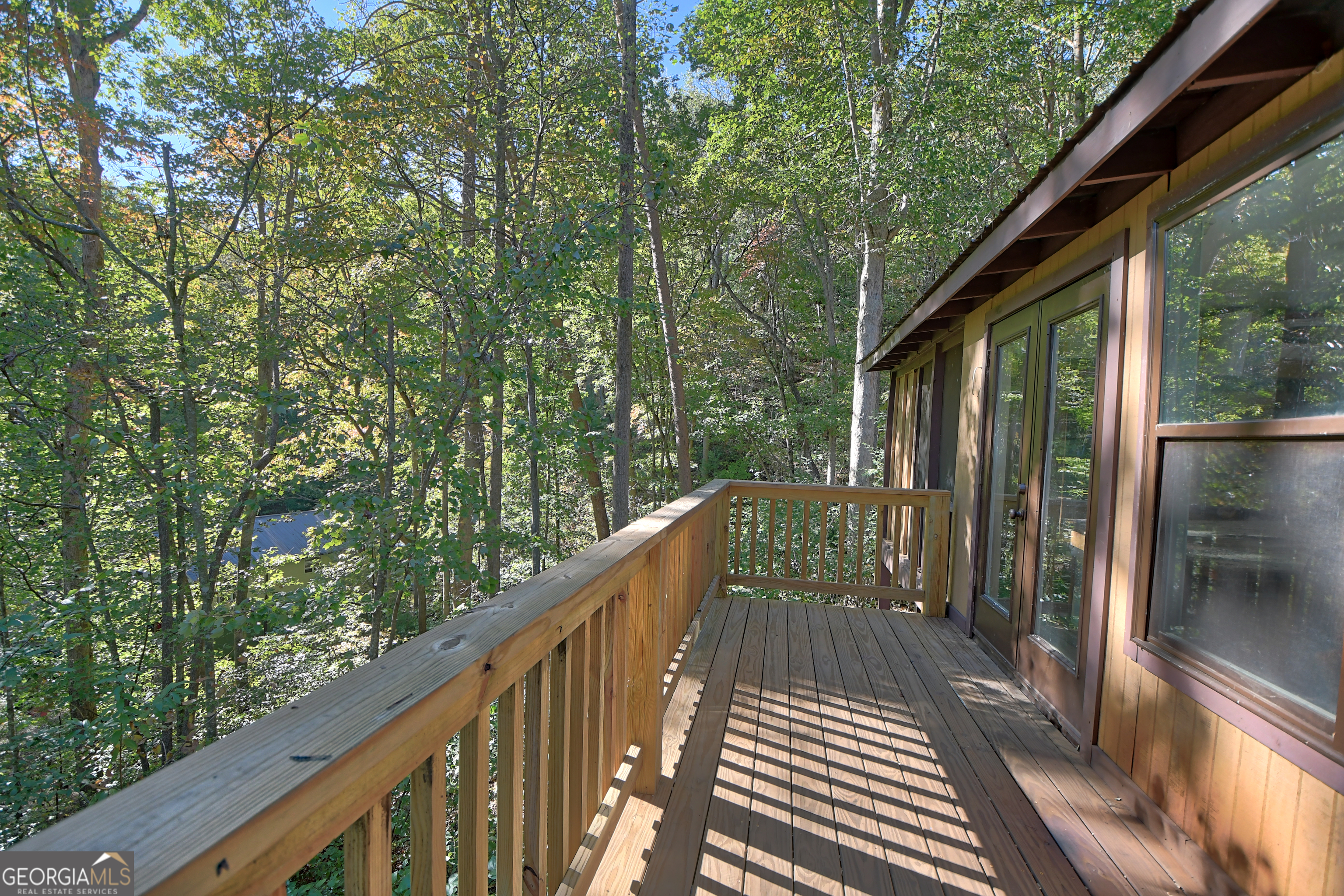 31 Creekside Lane Clayton, GA 30525 - Photo 53 of 65 a view of balcony with wooden floor and fence