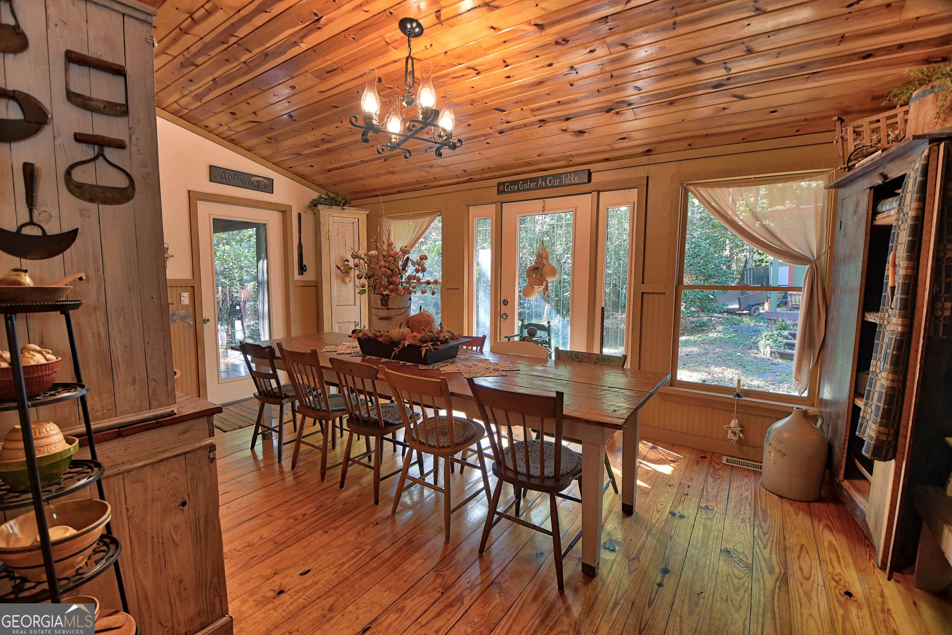 31 Creekside Lane Clayton, GA 30525 - Photo 10 of 65 a view of a dining room with furniture window and wooden floor