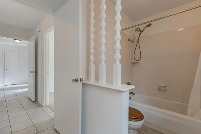 a view of workspace with window and cabinet in a room
