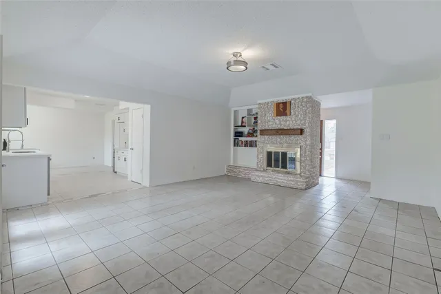 a view of a livingroom with a fireplace