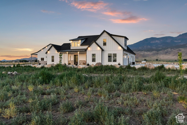 1952 Highway 118 Monroe, UT 84754 - Photo 64 of 88 Modern farmhouse with a standing seam roof, board and batten siding, a metal roof, and a mountain view