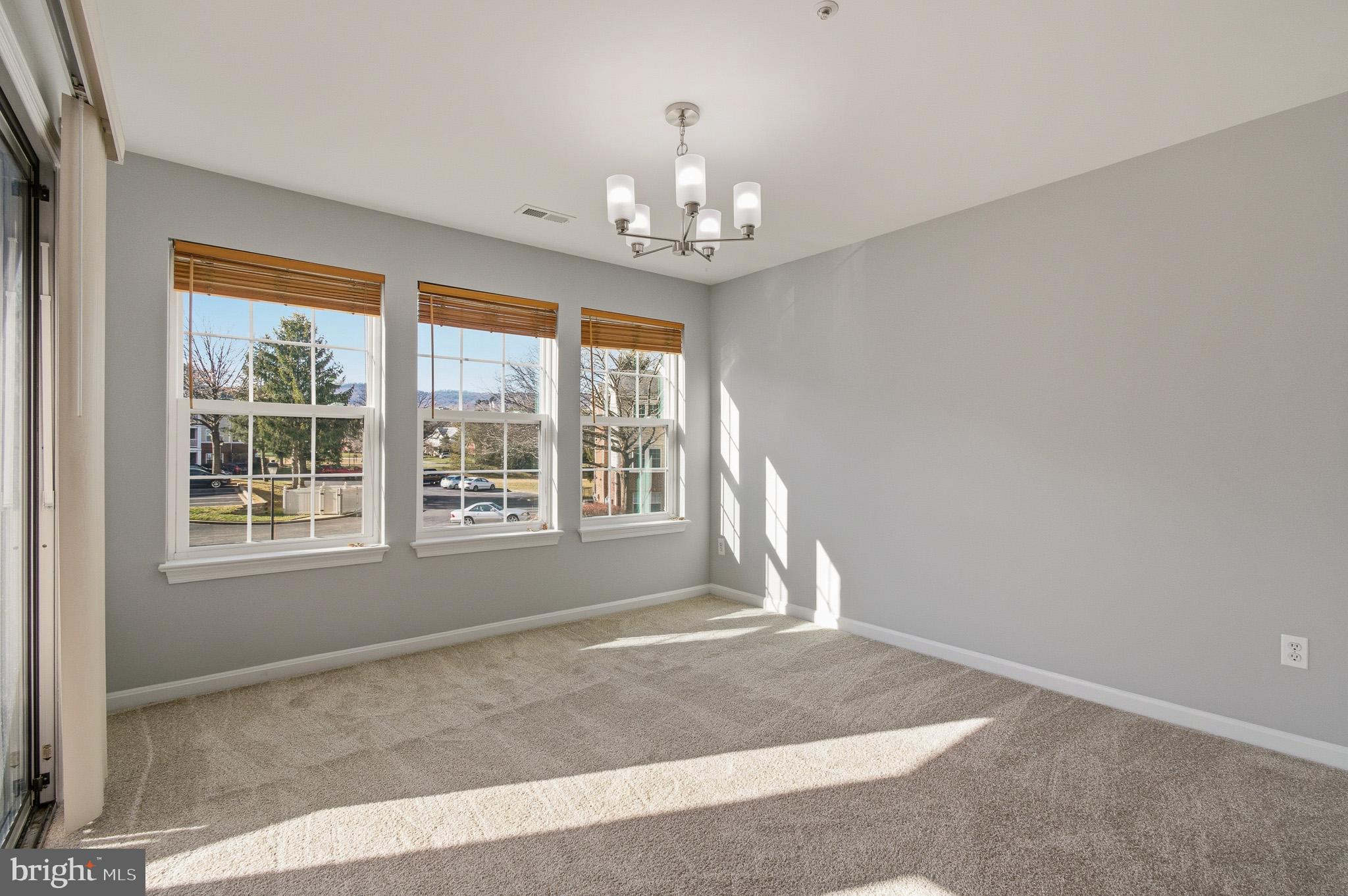 2400 Ellsworth Way, Unit 2D Frederick, MD 21702 - Photo 14 of 34 a view of an empty room with a window