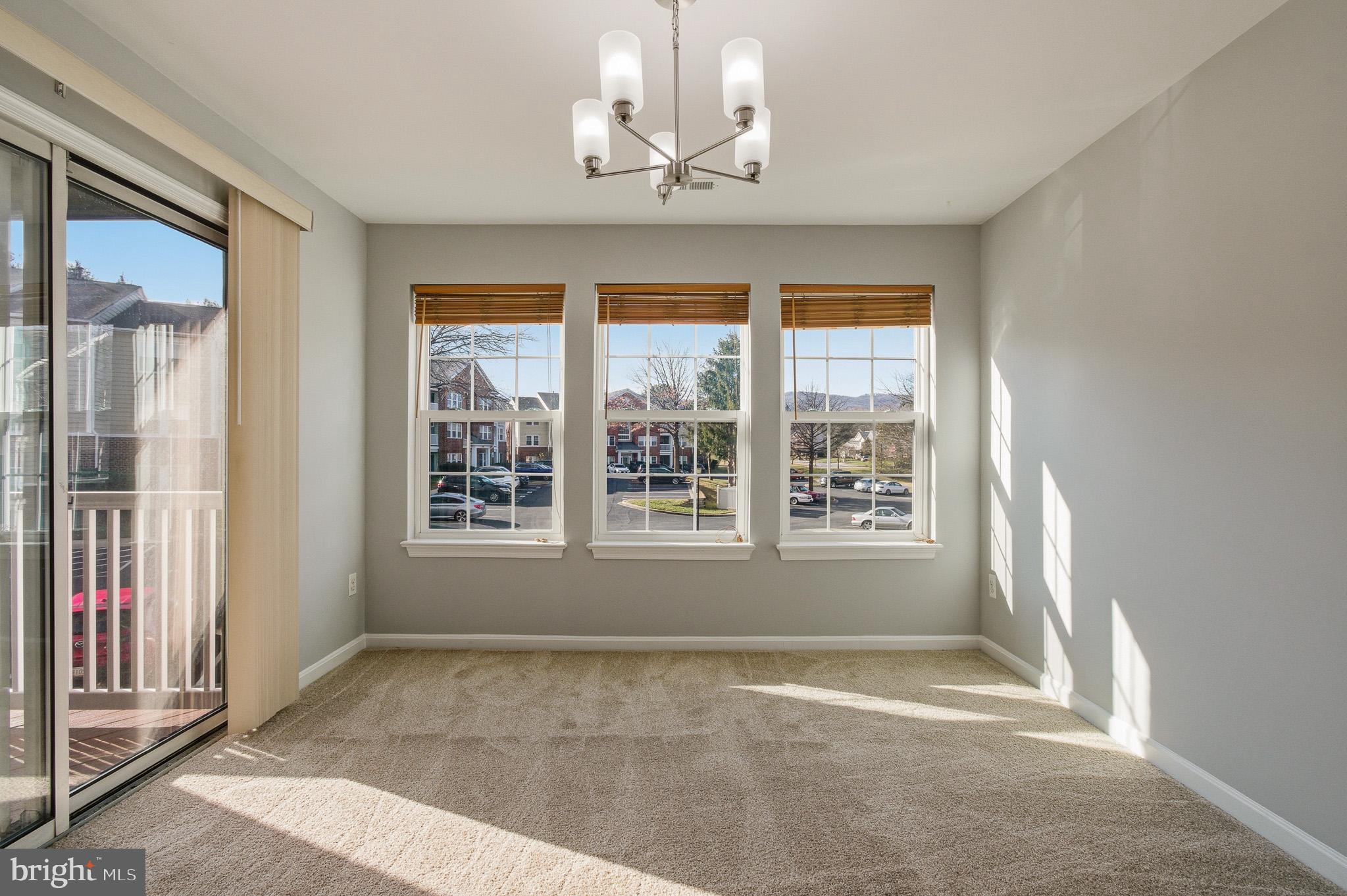2400 Ellsworth Way, Unit 2D Frederick, MD 21702 - Photo 17 of 34 a view of an empty room with a window
