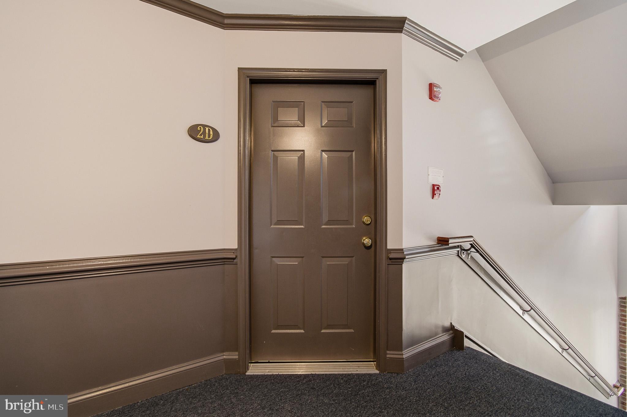 2400 Ellsworth Way, Unit 2D Frederick, MD 21702 - Photo 4 of 34 wooden floor in an empty room