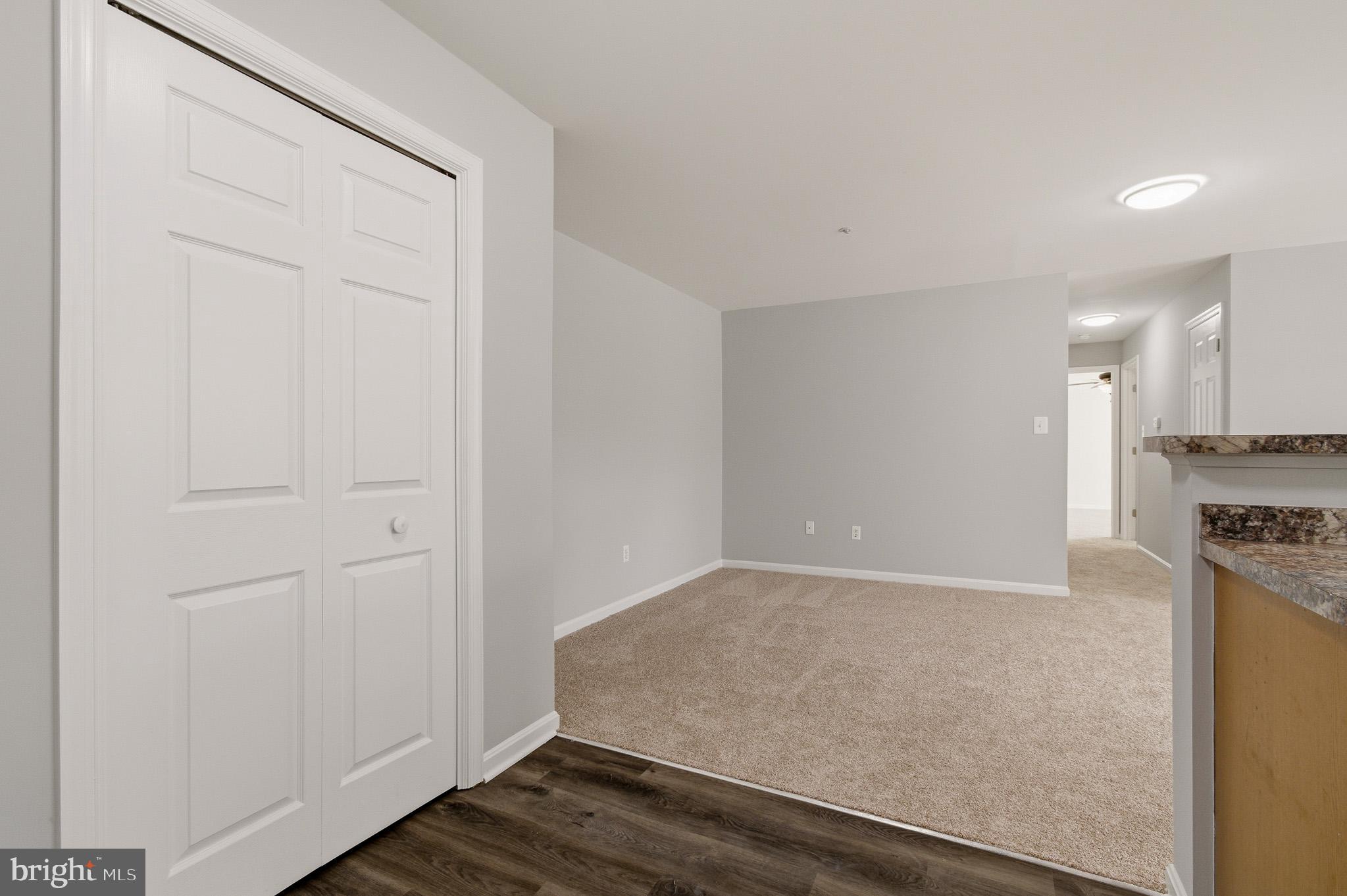 2400 Ellsworth Way, Unit 2D Frederick, MD 21702 - Photo 5 of 34 an empty room with wooden floor