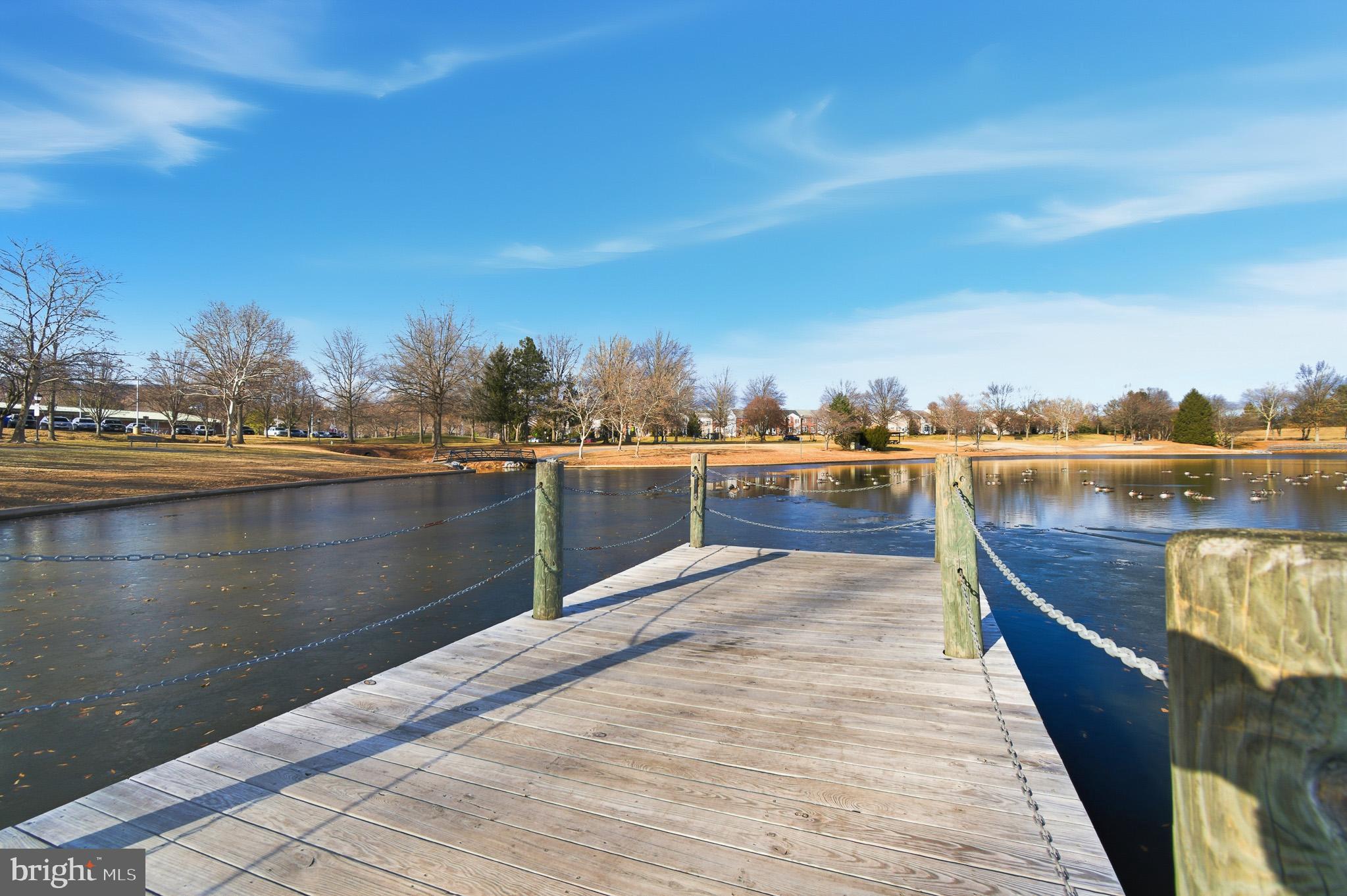 2400 Ellsworth Way, Unit 2D Frederick, MD 21702 - Photo 10 of 34 a view of a lake with a outdoor space