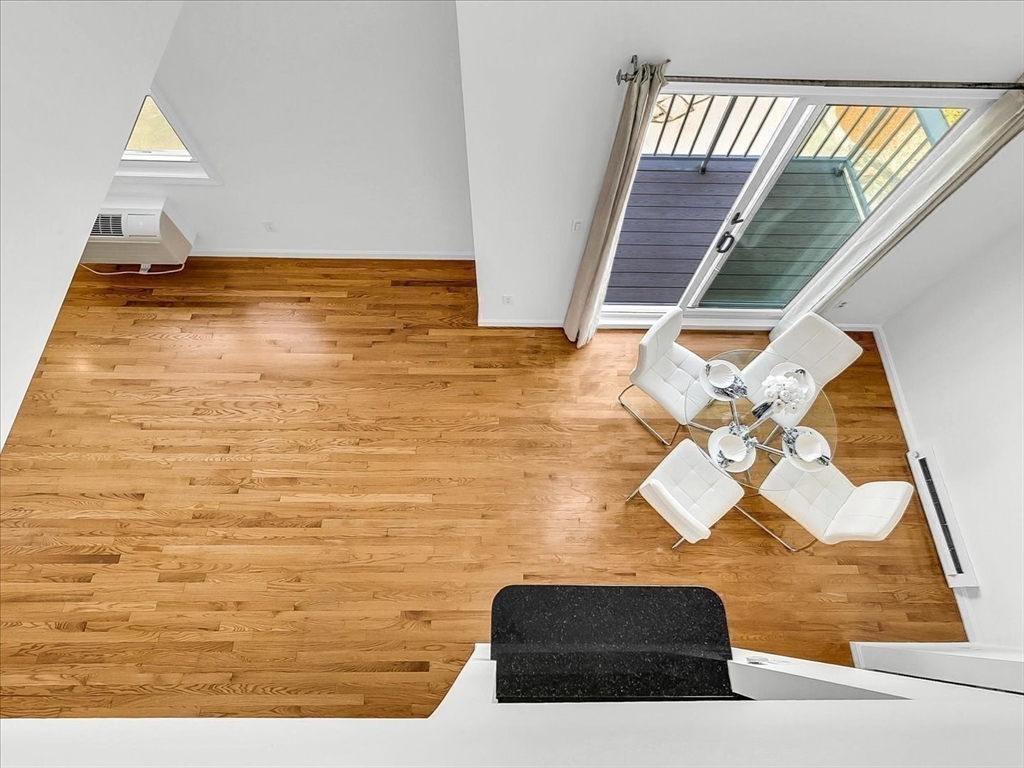 115 Water Street, Unit 14 Beverly, MA 01915 - Photo 12 of 38 a view of ocean from a hallway