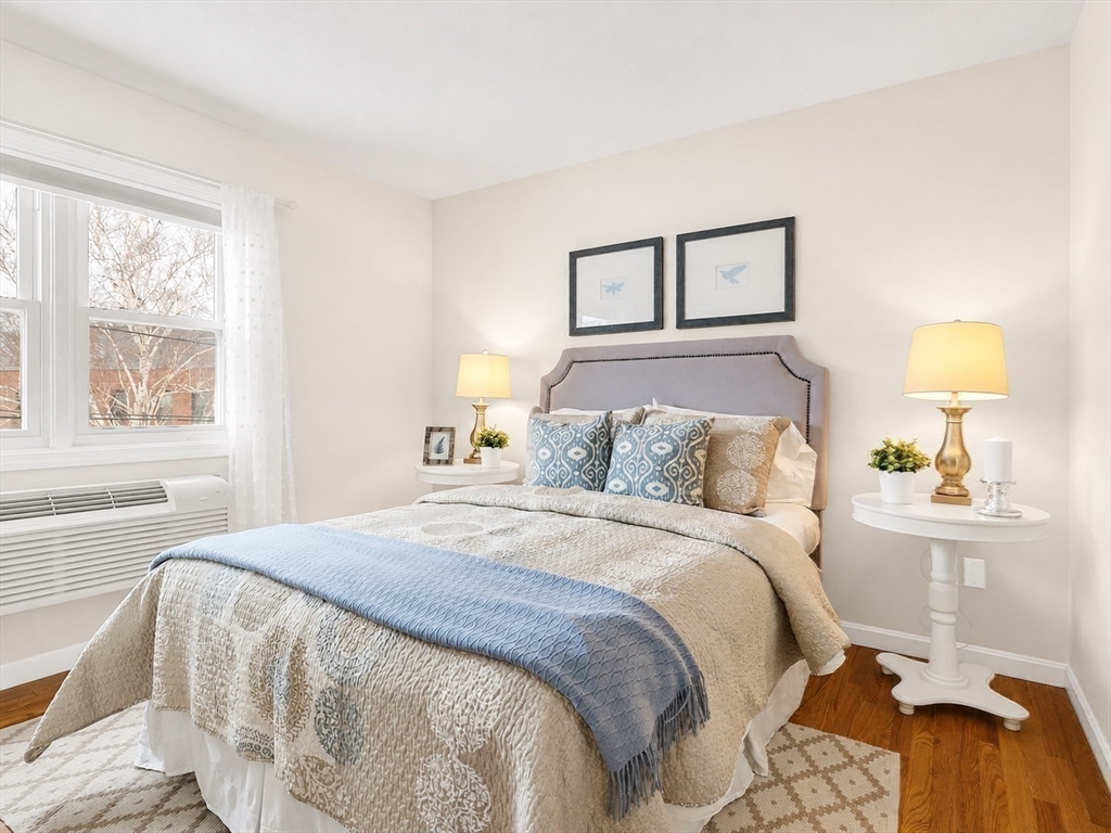 115 Water Street, Unit 14 Beverly, MA 01915 - Photo 20 of 38 a bedroom with a bed and a window