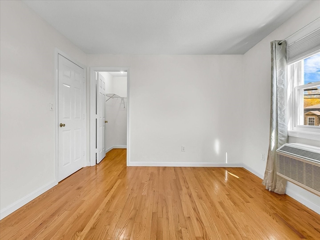 115 Water Street, Unit 14 Beverly, MA 01915 - Photo 23 of 38 a view of a room with wooden floor and a window