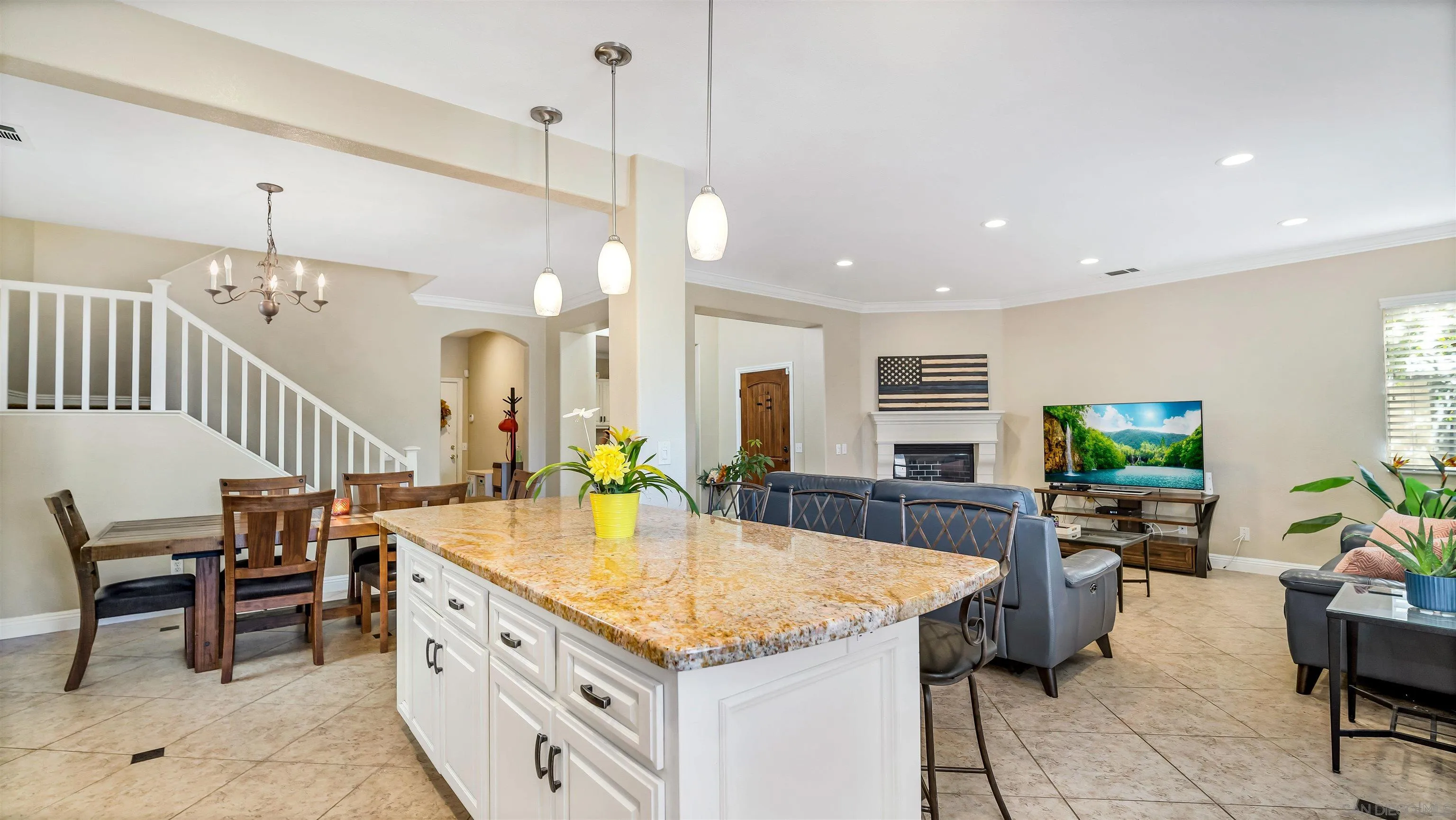 16163 Setting Sun Circle Riverside, CA 92503 - Photo 13 of 45 a kitchen with sink cabinets and dining table