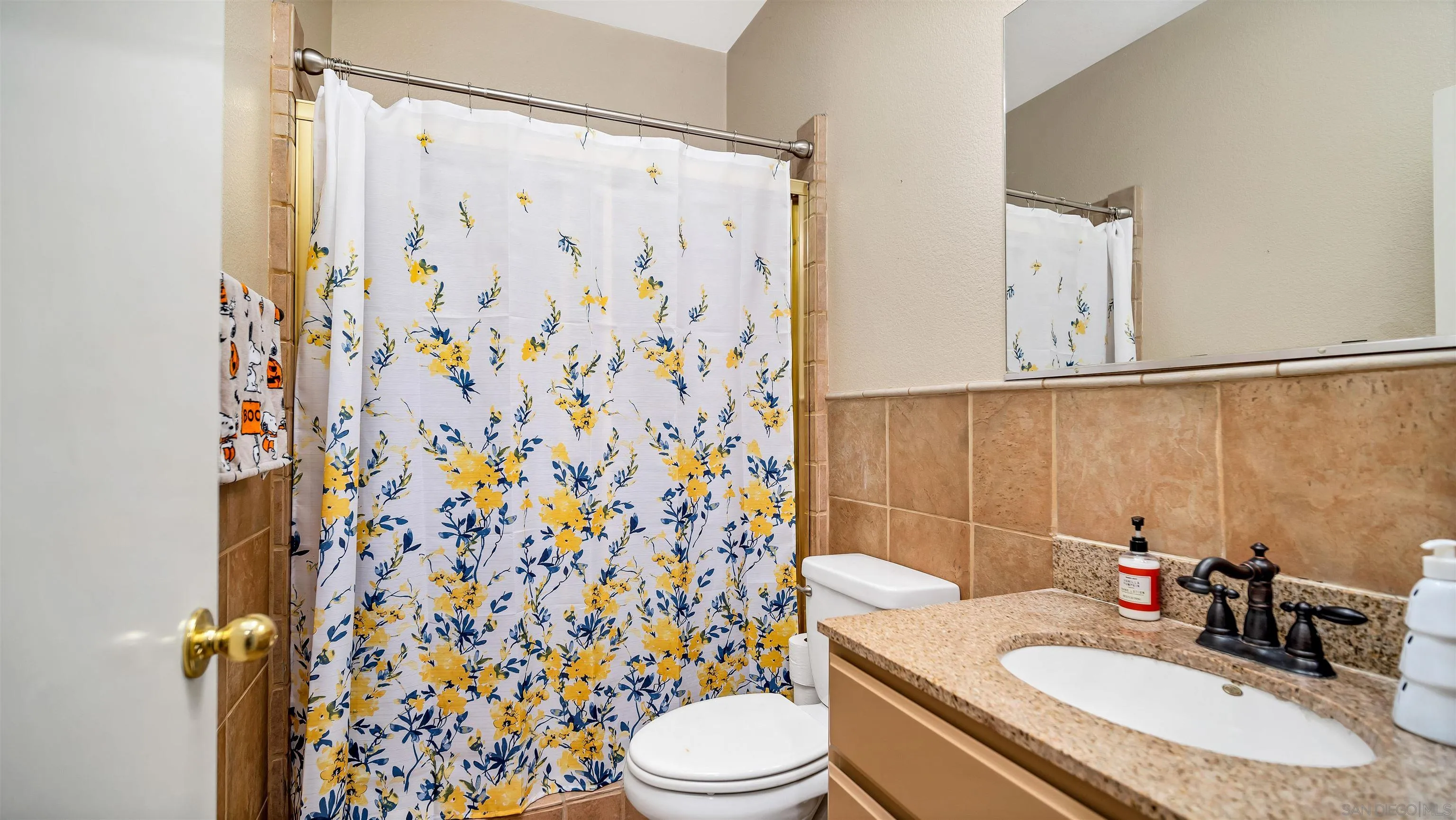 16163 Setting Sun Circle Riverside, CA 92503 - Photo 16 of 45 a bathroom with a sink toilet and shower