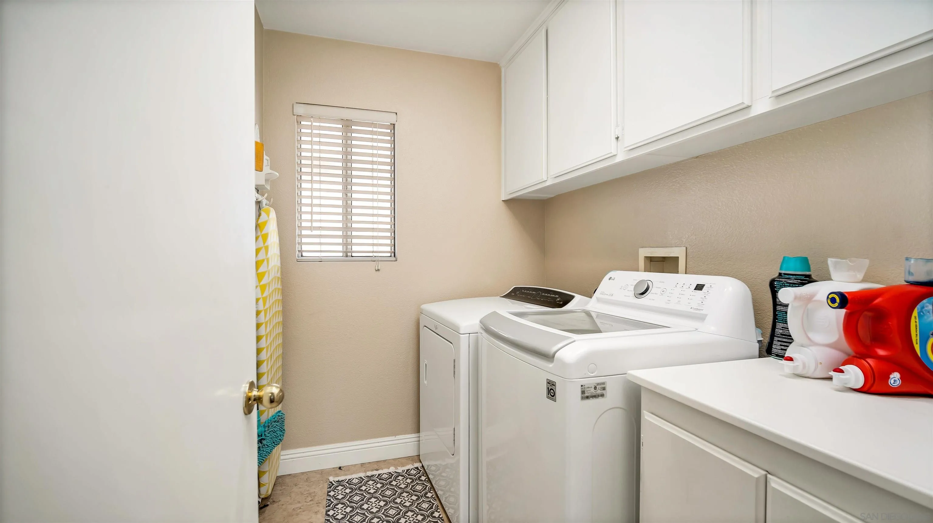 16163 Setting Sun Circle Riverside, CA 92503 - Photo 18 of 45 a utility room with dryer and washer
