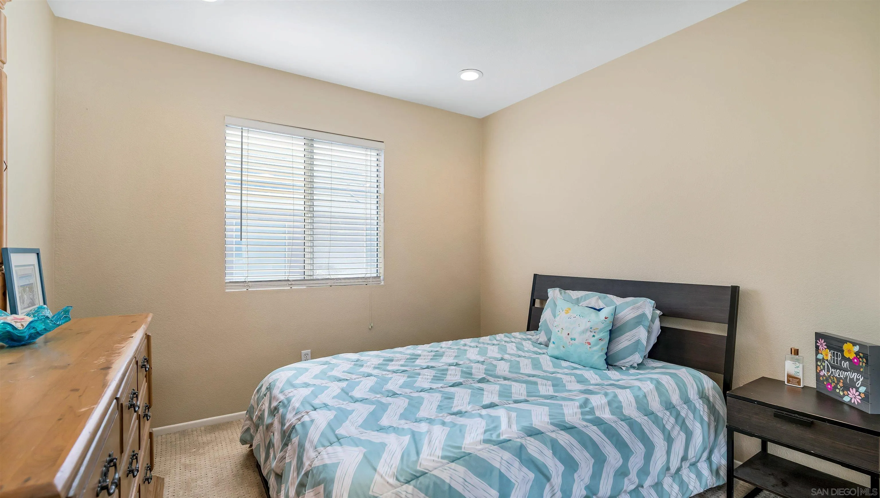 16163 Setting Sun Circle Riverside, CA 92503 - Photo 19 of 45 a bedroom with a bed and window