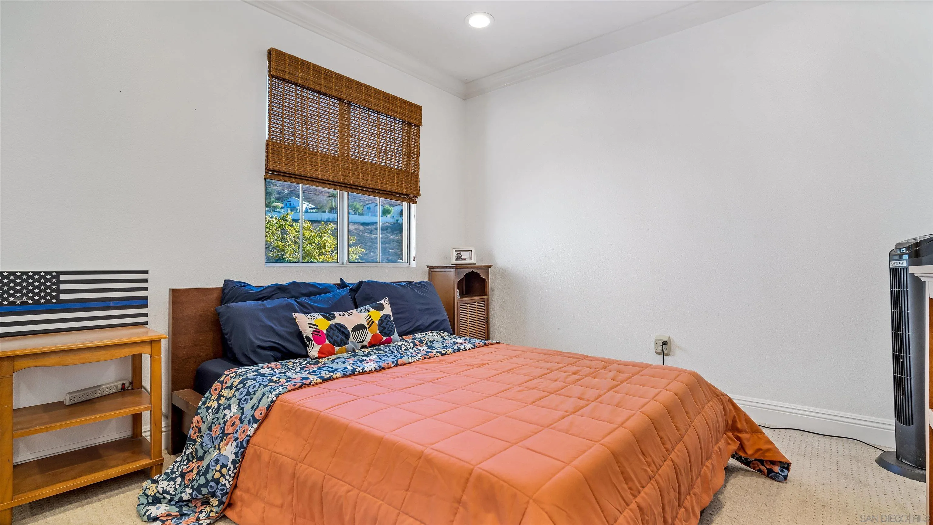 16163 Setting Sun Circle Riverside, CA 92503 - Photo 21 of 45 a bedroom with a bed and window