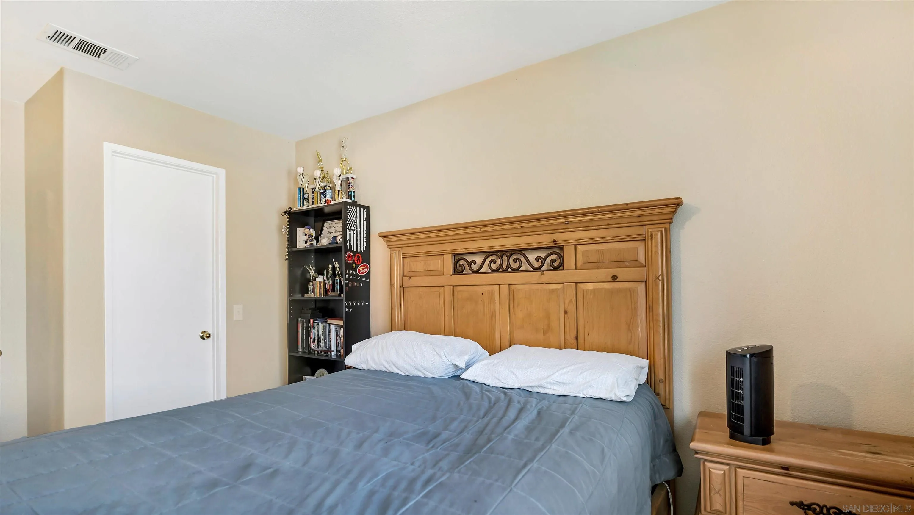 16163 Setting Sun Circle Riverside, CA 92503 - Photo 24 of 45 a bed room with a bed