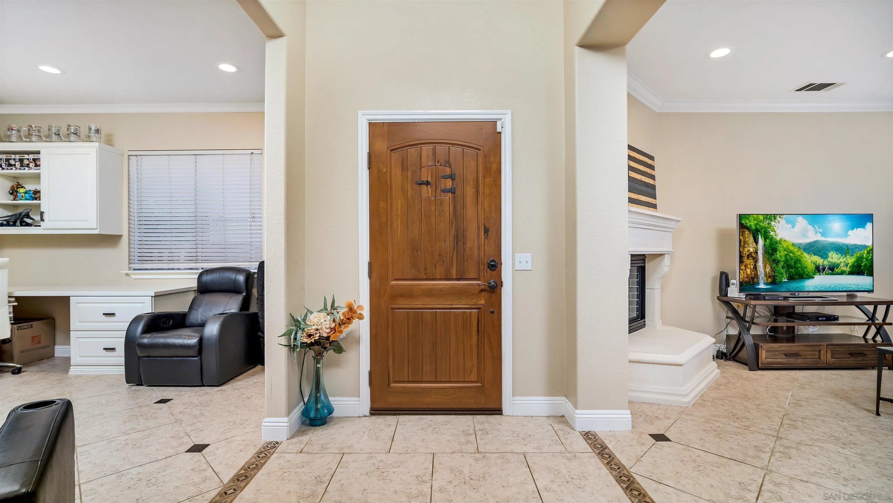 16163 Setting Sun Circle Riverside, CA 92503 - Photo 3 of 45 a hallway with dining area and natural light