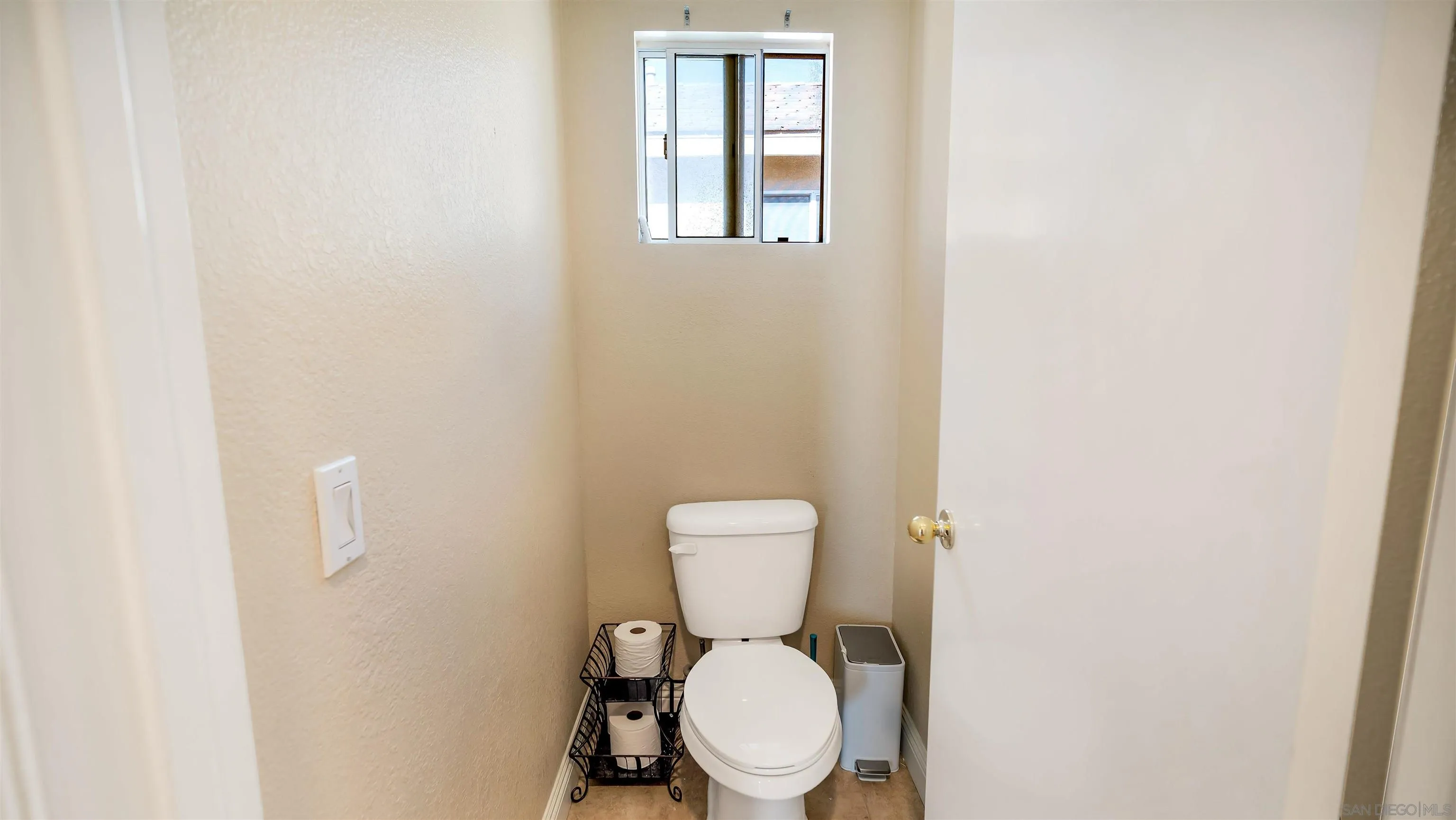 16163 Setting Sun Circle Riverside, CA 92503 - Photo 33 of 45 a white toilet sitting in a bathroom