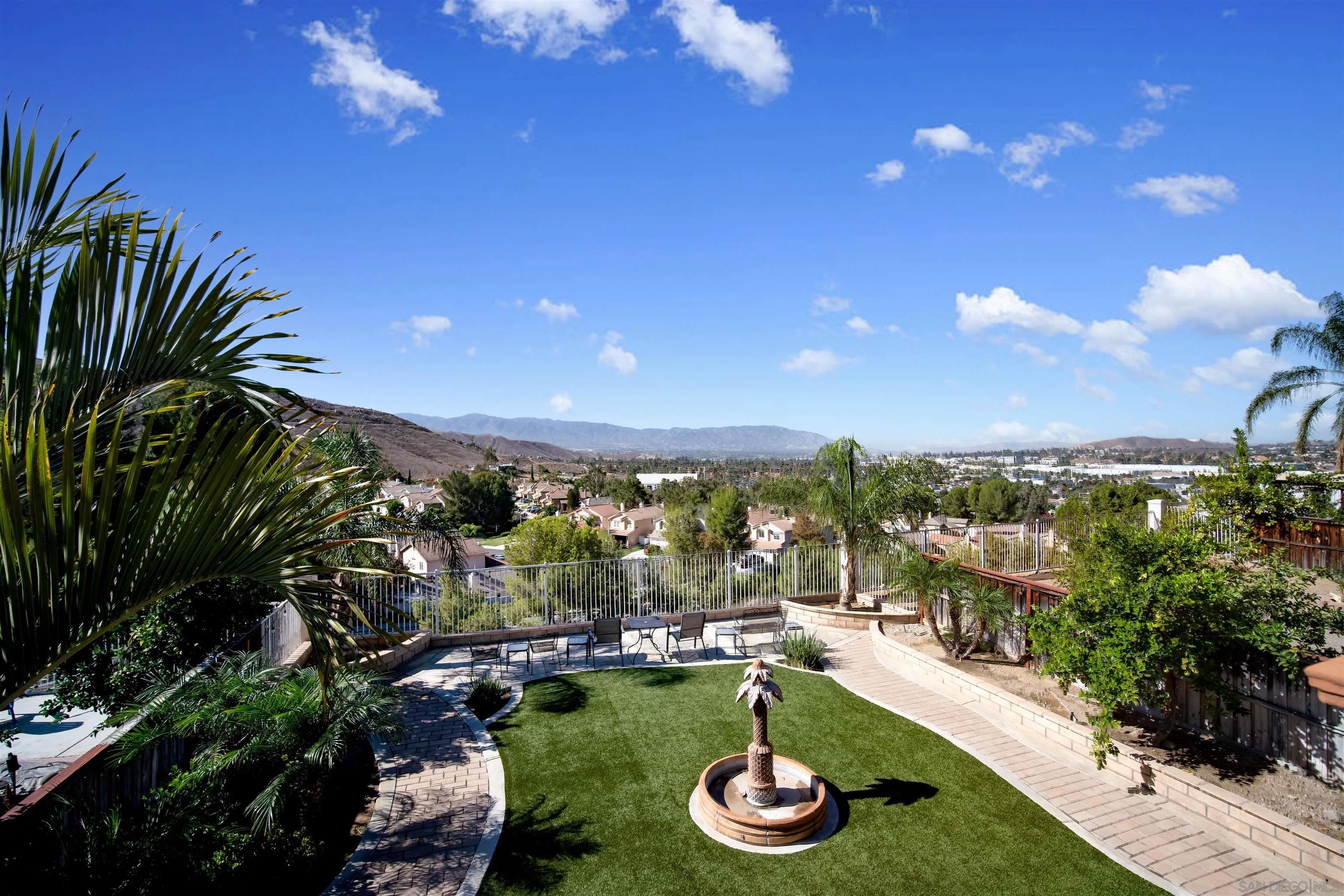 16163 Setting Sun Circle Riverside, CA 92503 - Photo 36 of 45 a view of a swimming pool with garden
