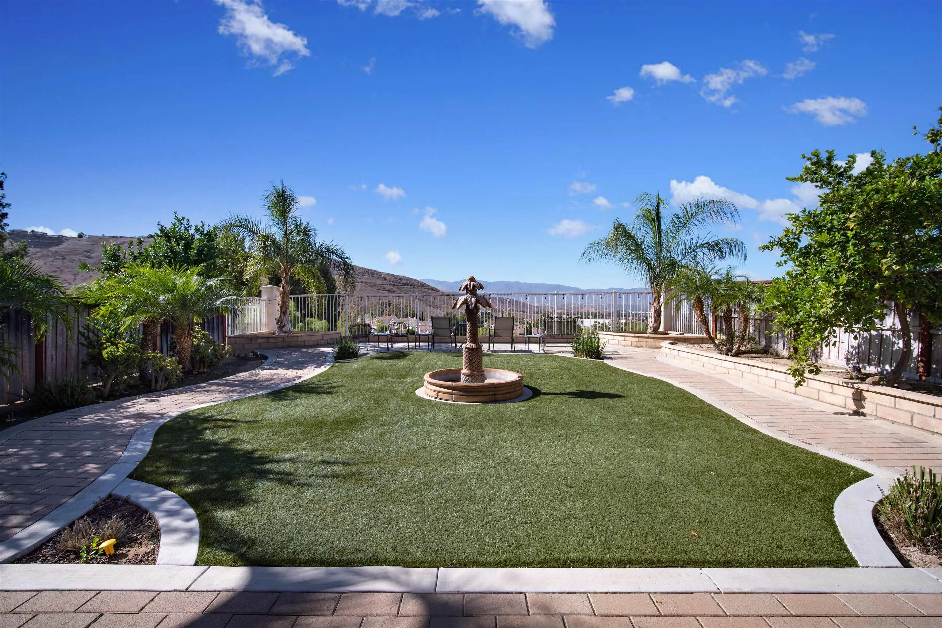 16163 Setting Sun Circle Riverside, CA 92503 - Photo 39 of 45 a view of a fountain in the backyard of the house