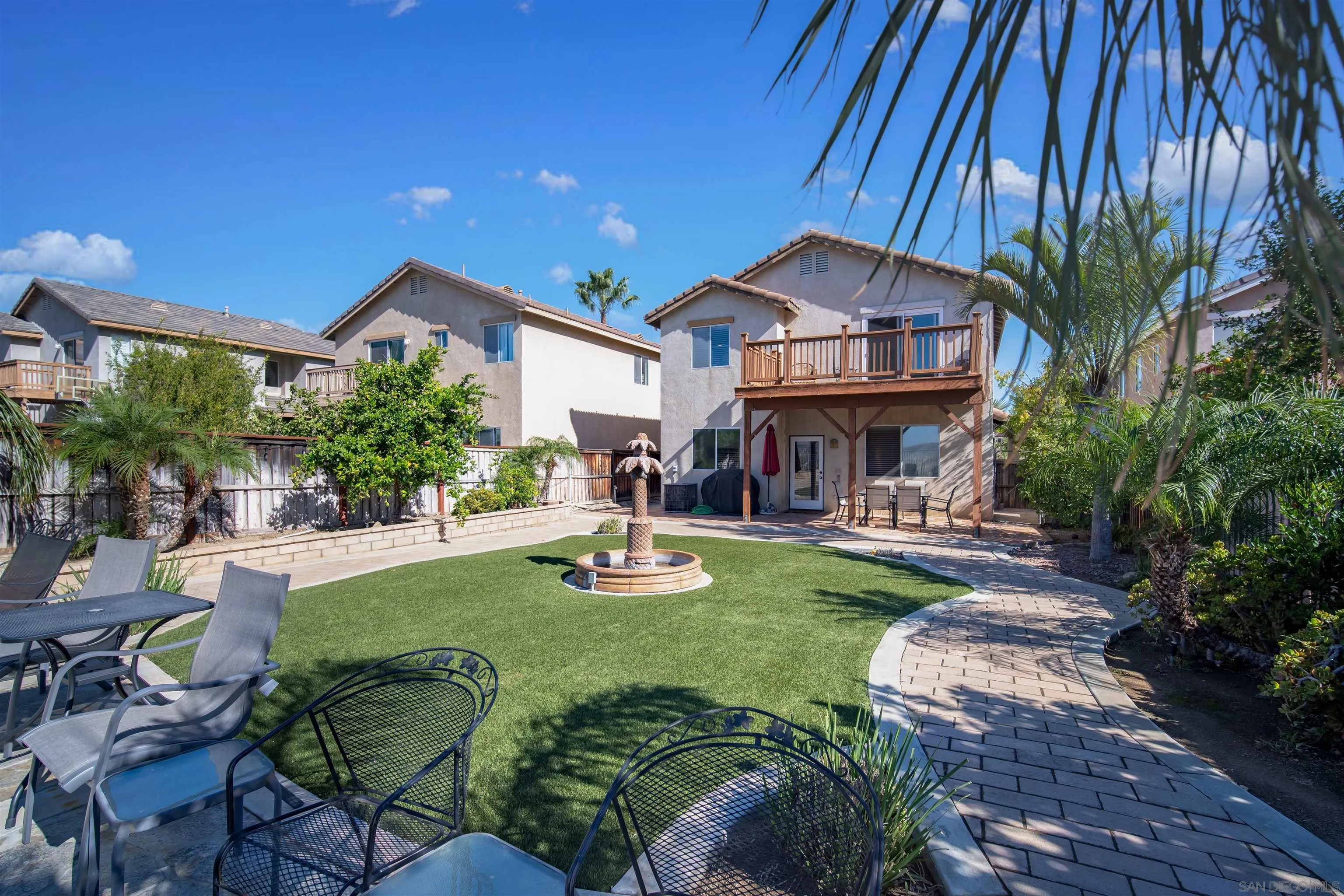 16163 Setting Sun Circle Riverside, CA 92503 - Photo 40 of 45 a front view of a house with garden and patio