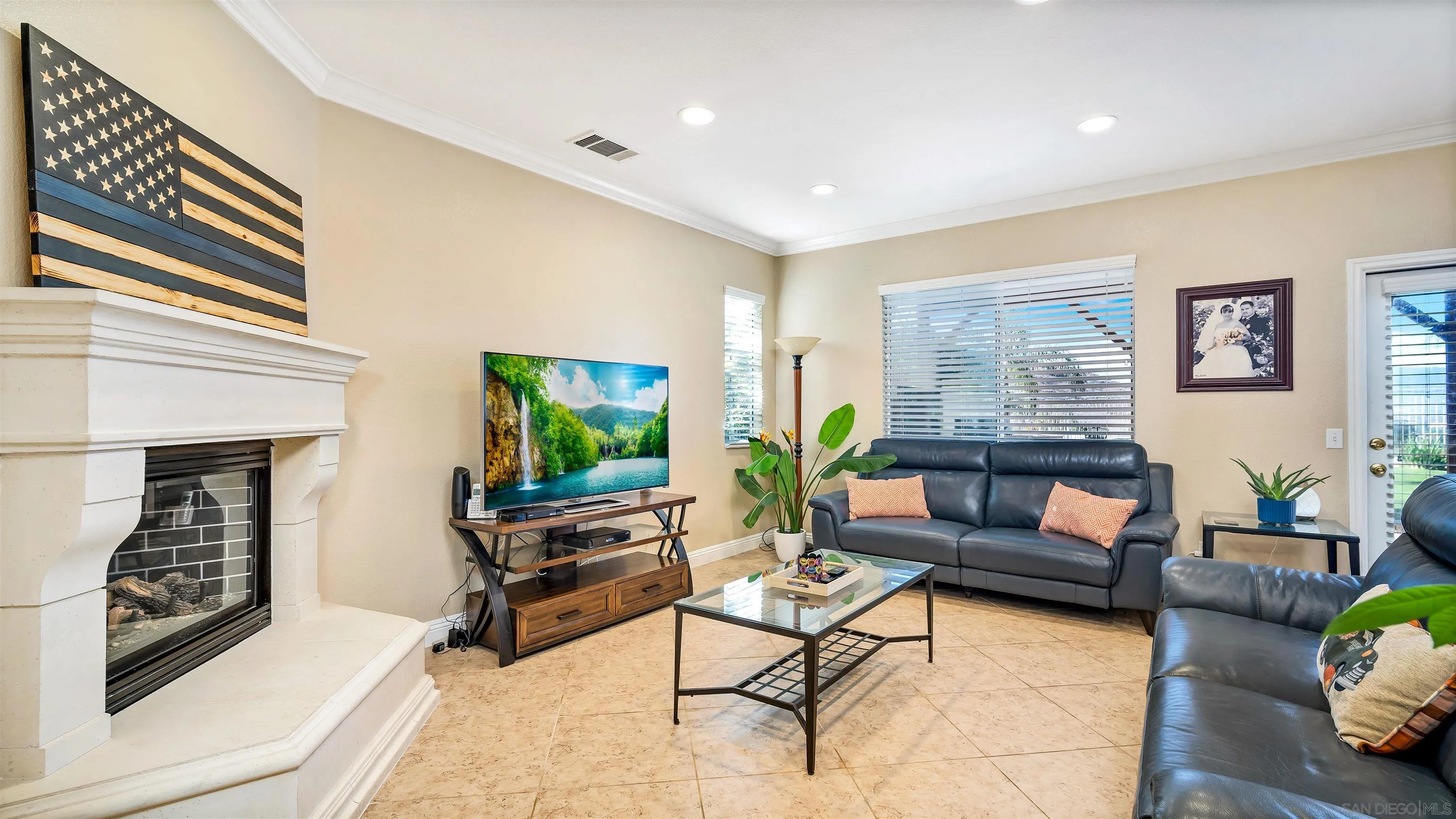 16163 Setting Sun Circle Riverside, CA 92503 - Photo 4 of 45 a living room with furniture and a fireplace
