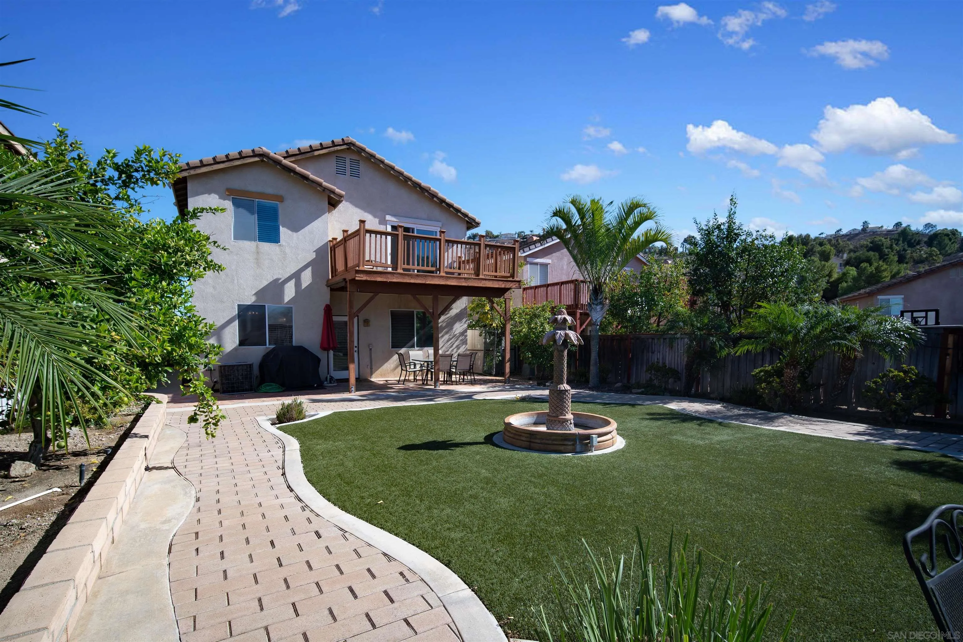 16163 Setting Sun Circle Riverside, CA 92503 - Photo 42 of 45 a view of a house with backyard sitting area and garden