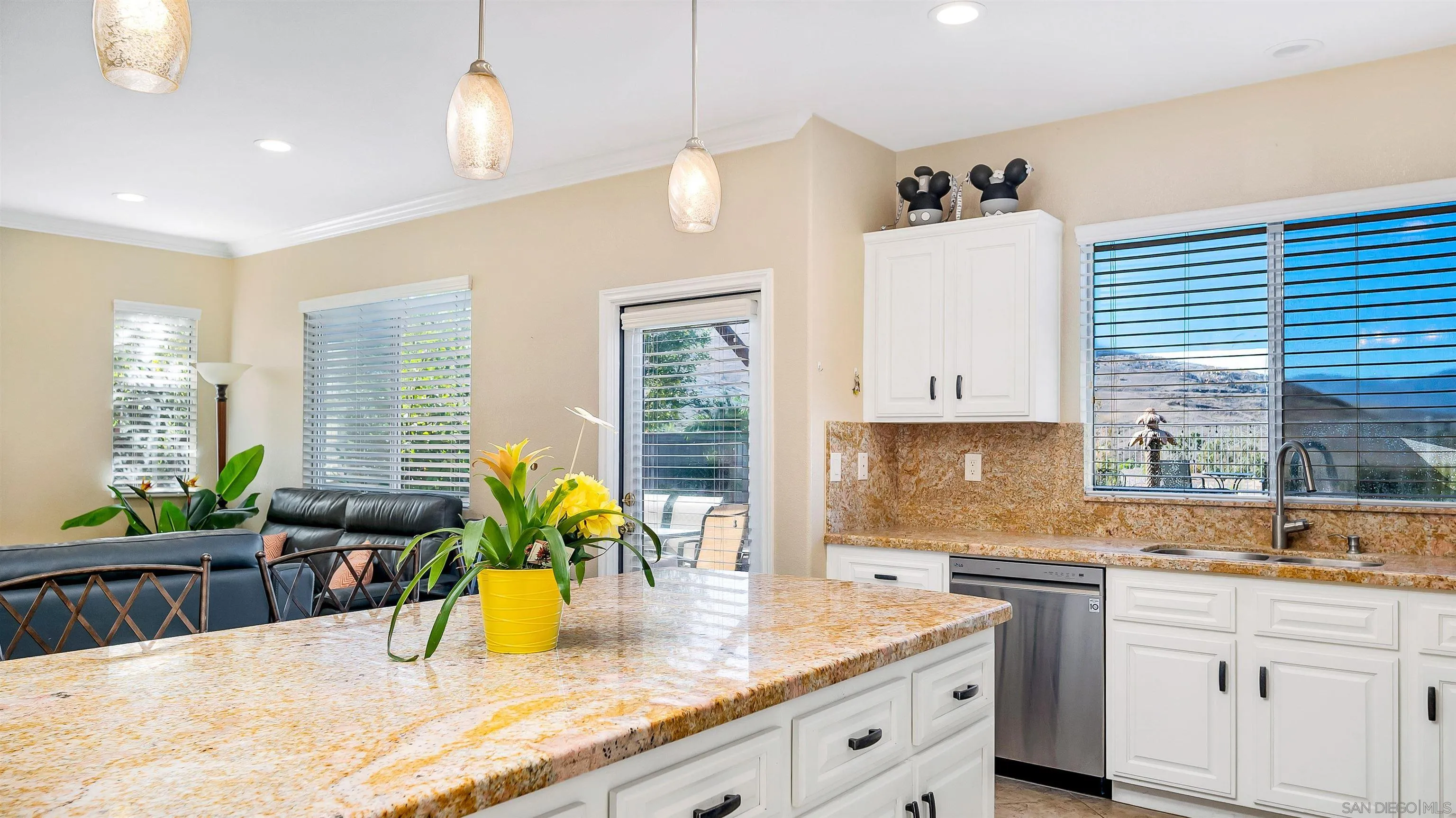 16163 Setting Sun Circle Riverside, CA 92503 - Photo 10 of 45 a kitchen with sink and cabinets