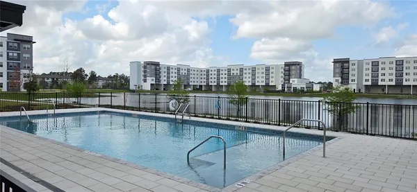 a view of buildings with yard