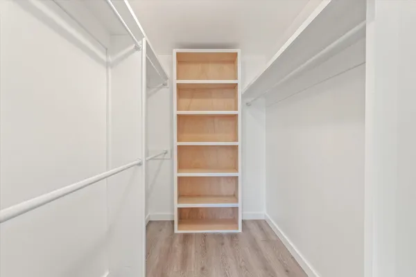 a storage room with wooden floor