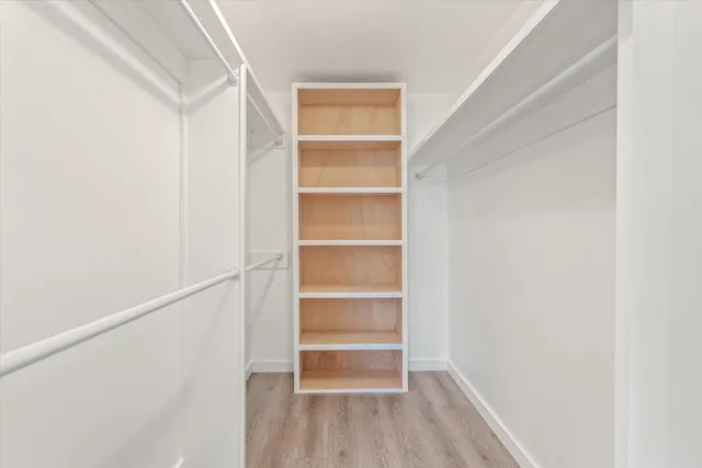 a storage room with wooden floor