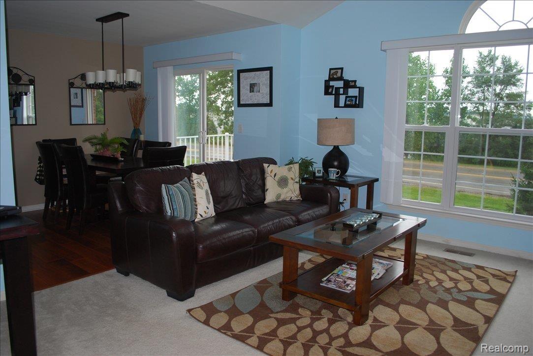 1786 Flagstone Circle, Unit 13 Rochester, MI 48307 - Photo 13 of 16 Family room and dining room