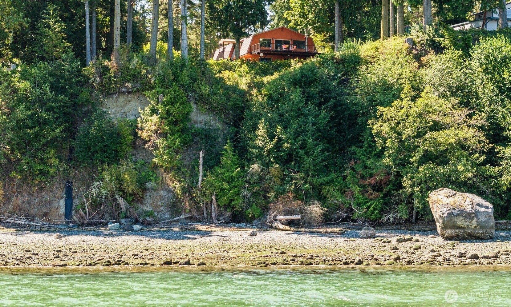 681 Bachelor Road Sequim, WA 98382 - Photo 2 of 39 a view of a lake with a house