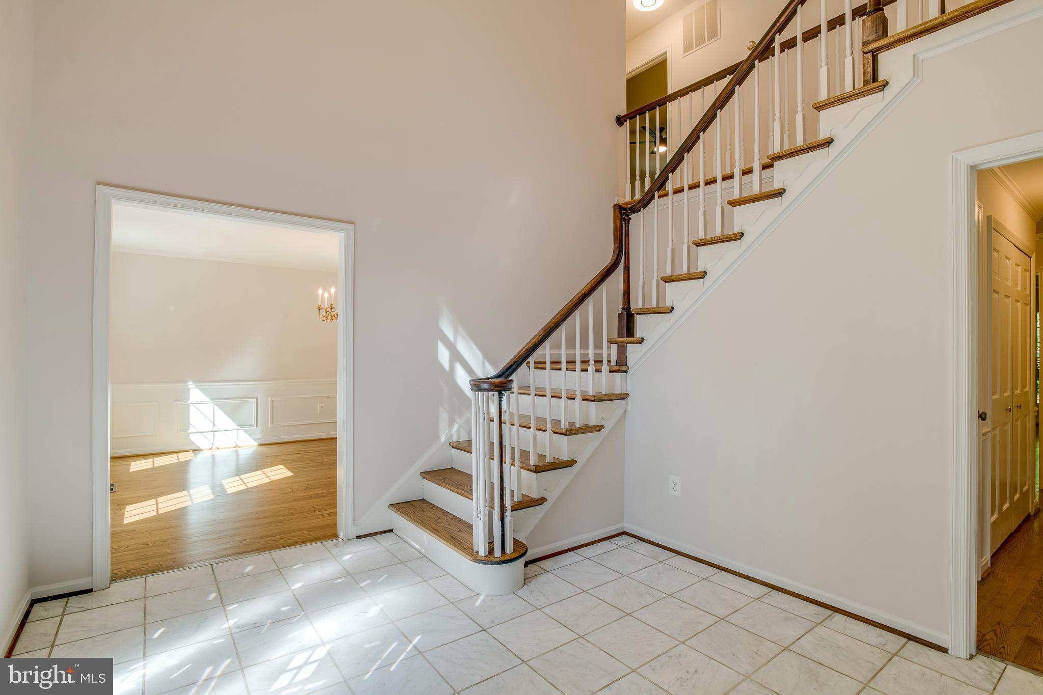 11740 Stuart Mill Road Oakton, VA 22124 - Photo 11 of 67 Dining Room on left at Foyer
