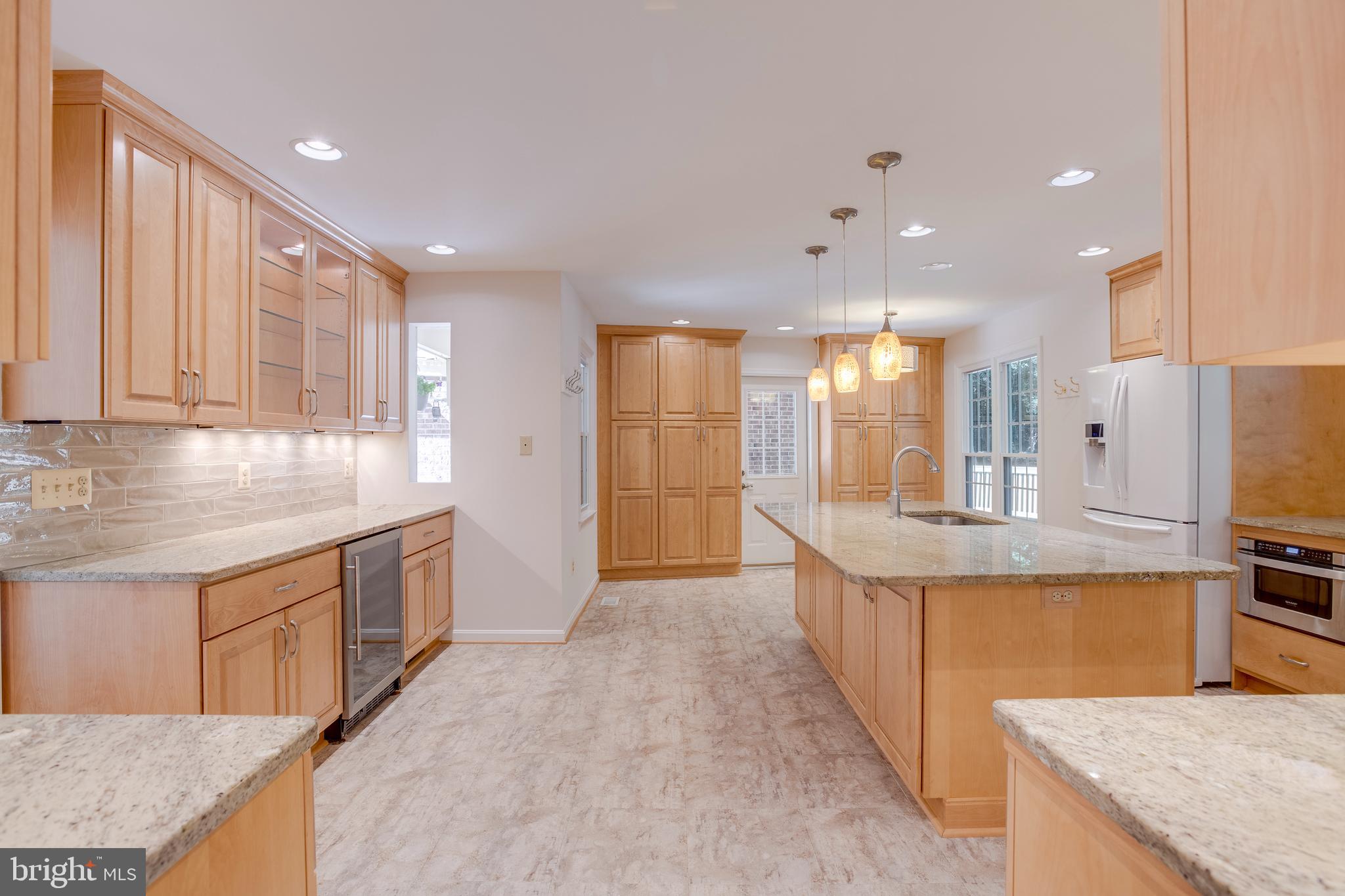 11740 Stuart Mill Road Oakton, VA 22124 - Photo 19 of 67 Granite Counters, Pendant Lights, Recessed LIghts