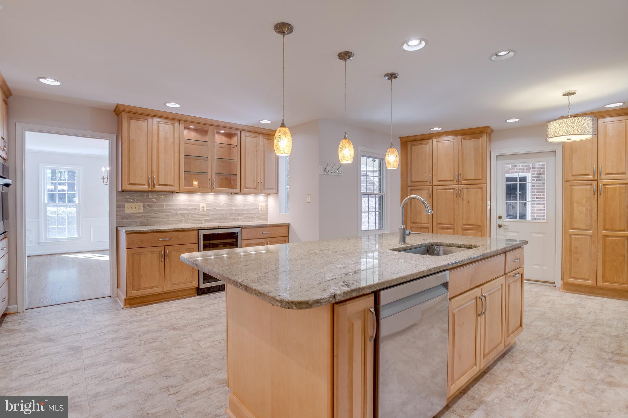 11740 Stuart Mill Road Oakton, VA 22124 - Photo 20 of 67 Center Island with sink and dishwasher