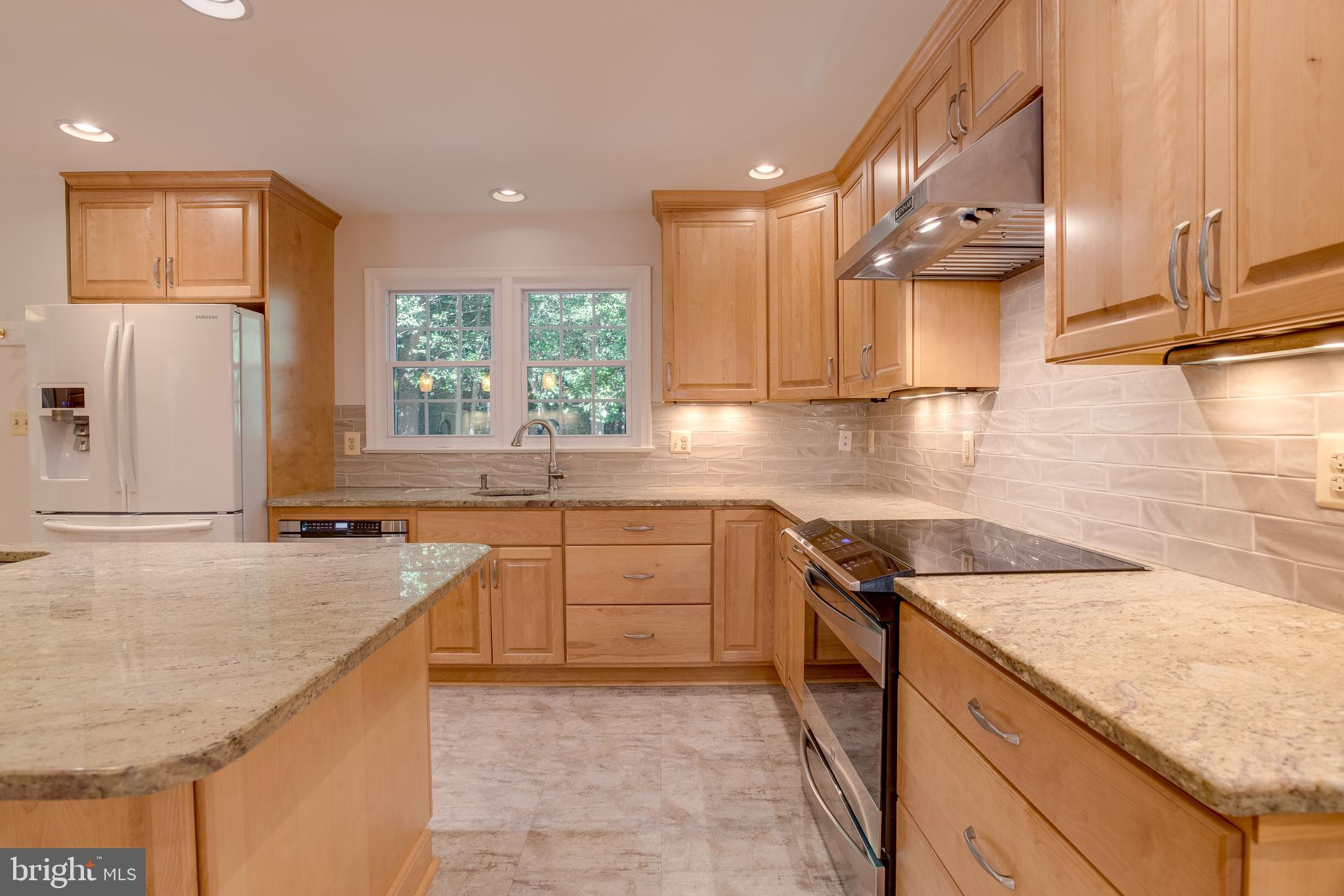 11740 Stuart Mill Road Oakton, VA 22124 - Photo 23 of 67 Oven with cooktop